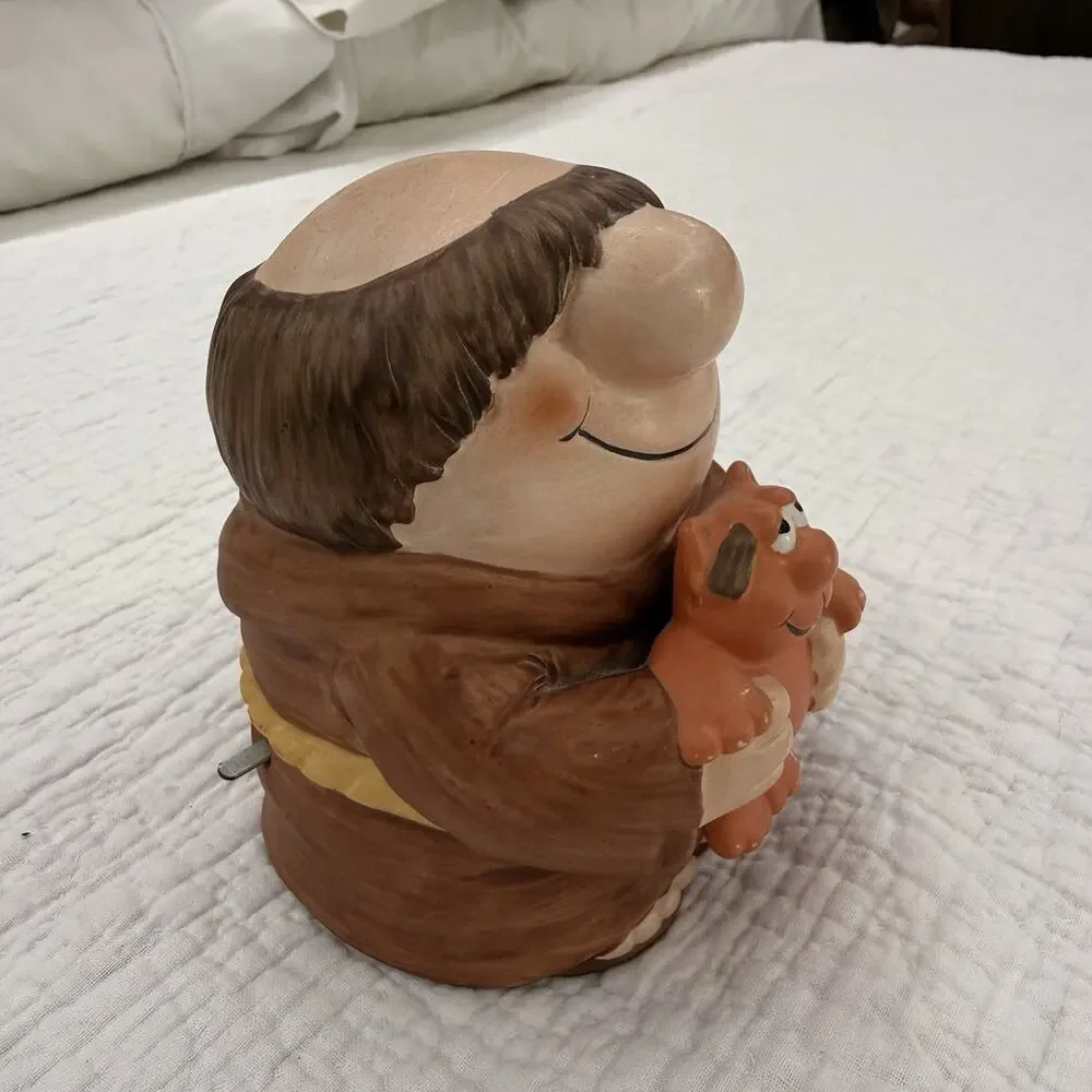 Wind-Up Ziggy Cartoon Figurine Smiling Padre Holding Dog Ceramic/Wood Brown